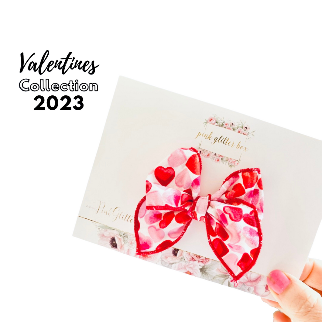 Valentine’s poppy bow - red & pink hearts